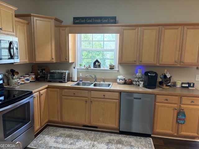 610 Birch Lane Clarkesville, GA 30523 - Photo 20 of 46 a kitchen with stainless steel appliances granite countertop a sink a stove and cabinets