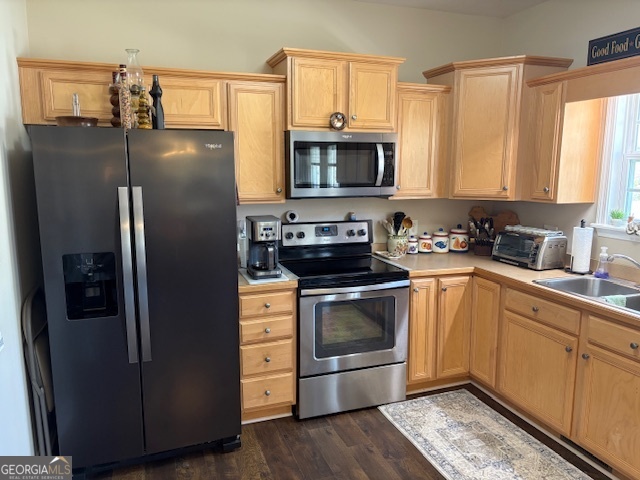 610 Birch Lane Clarkesville, GA 30523 - Photo 21 of 46 a kitchen with stainless steel appliances granite countertop a refrigerator a stove a sink and a microwave