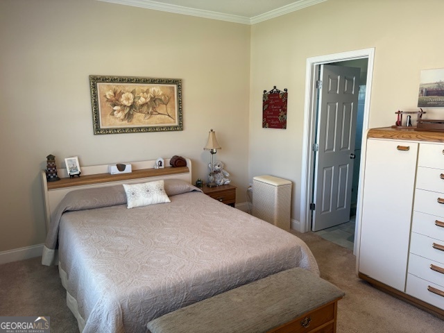 610 Birch Lane Clarkesville, GA 30523 - Photo 25 of 46 a bedroom with a bed and a refrigerator