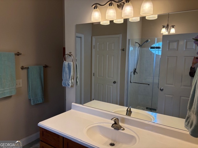 610 Birch Lane Clarkesville, GA 30523 - Photo 26 of 46 a bathroom with a sink and a mirror