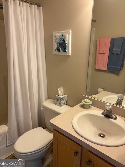 610 Birch Lane Clarkesville, GA 30523 - Photo 39 of 46 a bathroom with a sink and a mirror