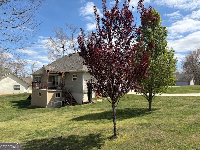 610 Birch Lane Clarkesville, GA 30523 - Photo 4 of 46 a house view with a garden space