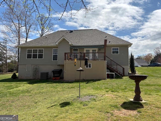 610 Birch Lane Clarkesville, GA 30523 - Photo 6 of 46 a house view with a garden space