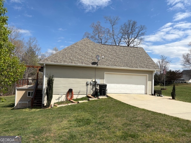 610 Birch Lane Clarkesville, GA 30523 - Photo 8 of 46 a view of a house with a yard and garage