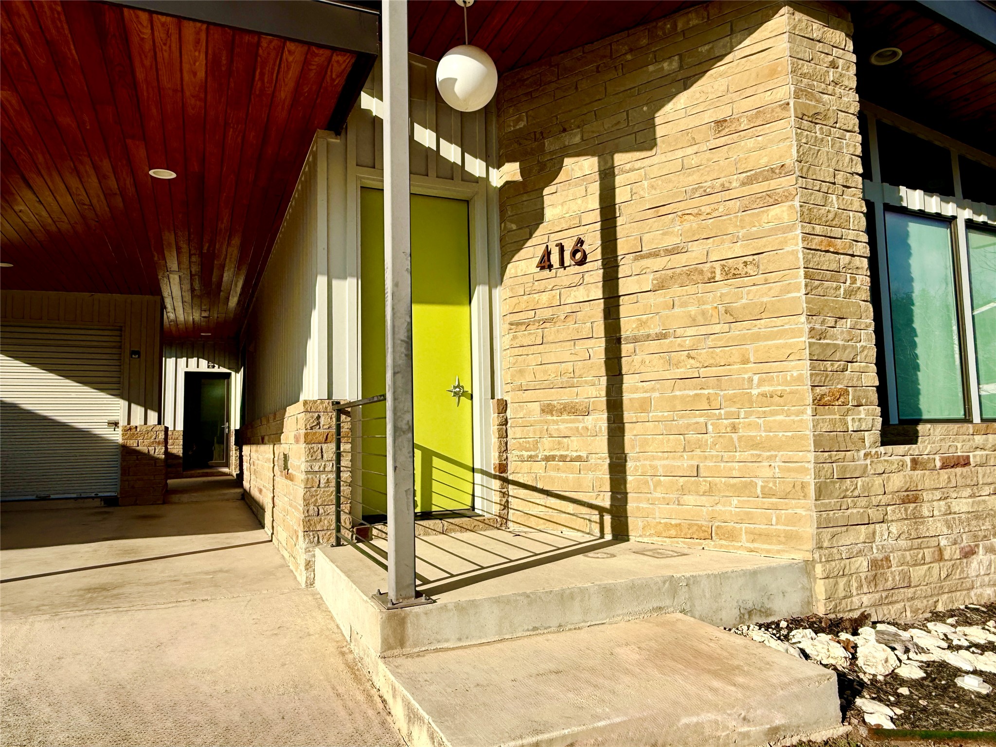 416 Starlight Village Loop Leander, TX 78641 - Photo 17 of 28 Doorway to property featuring a porch and brick siding