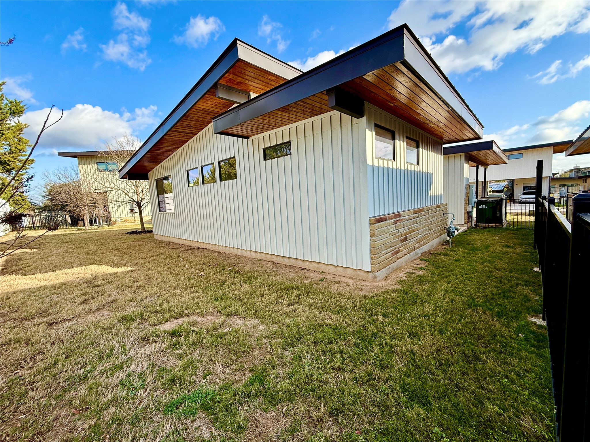 416 Starlight Village Loop Leander, TX 78641 - Photo 2 of 28 View of side of property with board and batten siding