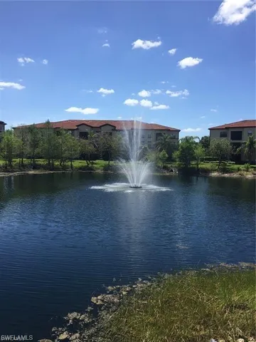 a view of lake with mountain