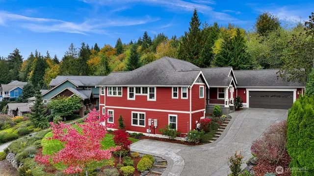 front view of a house with potted plants