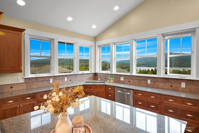 a kitchen with a large window