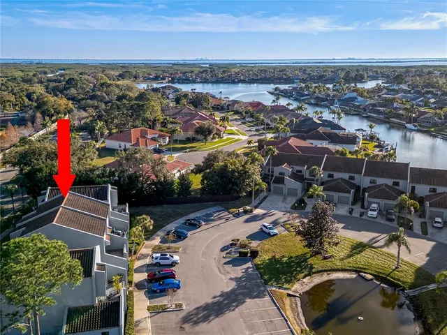 an aerial view of a houses with outdoor space