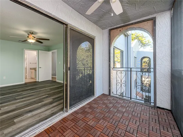 a view of empty room with windows