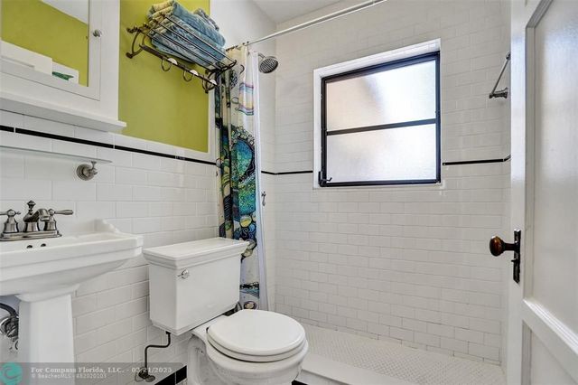 a view of swimming pool with outdoor seating