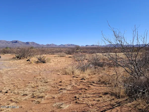 a view of mountain with lake view