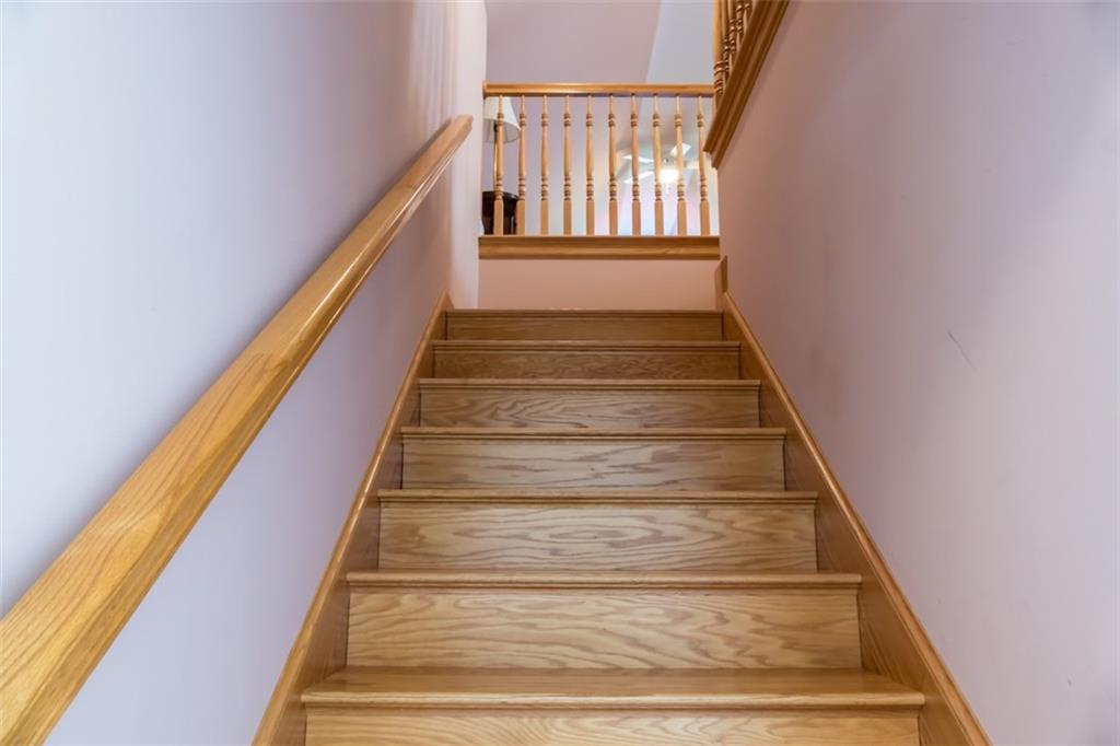 30 Middle Road Harpswell, ME 04079 - Photo 21 of 35 This wide staircase leads to the...