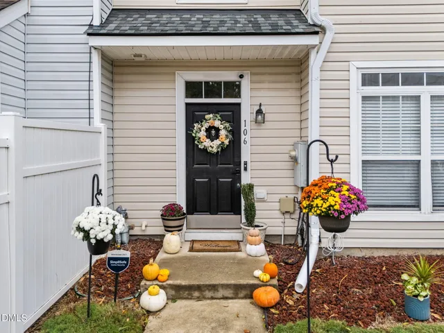 a view of a entryway with flower pots