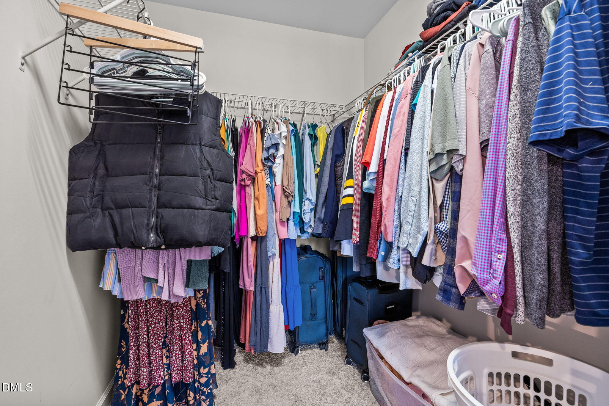 5011 Eagle Stone Lane, Unit 106 Raleigh, NC 27610 - Photo 21 of 21 a view of walk in closet with clothes
