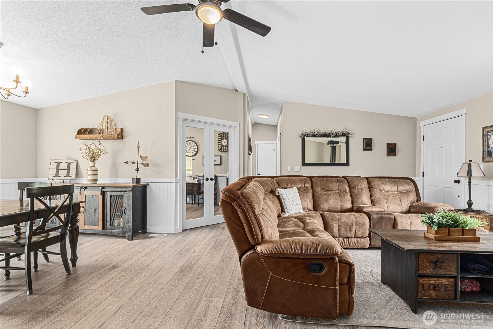4562 Lessig Road, Unit A Hunters, WA 99137 - Photo 4 of 34 a living room with furniture and a wooden floor