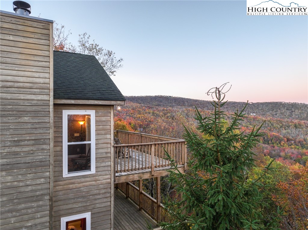 309 Pinnacle Ridge Road Beech Mountain, NC 28604 - Photo 31 of 45 a view of a terrace with a bench