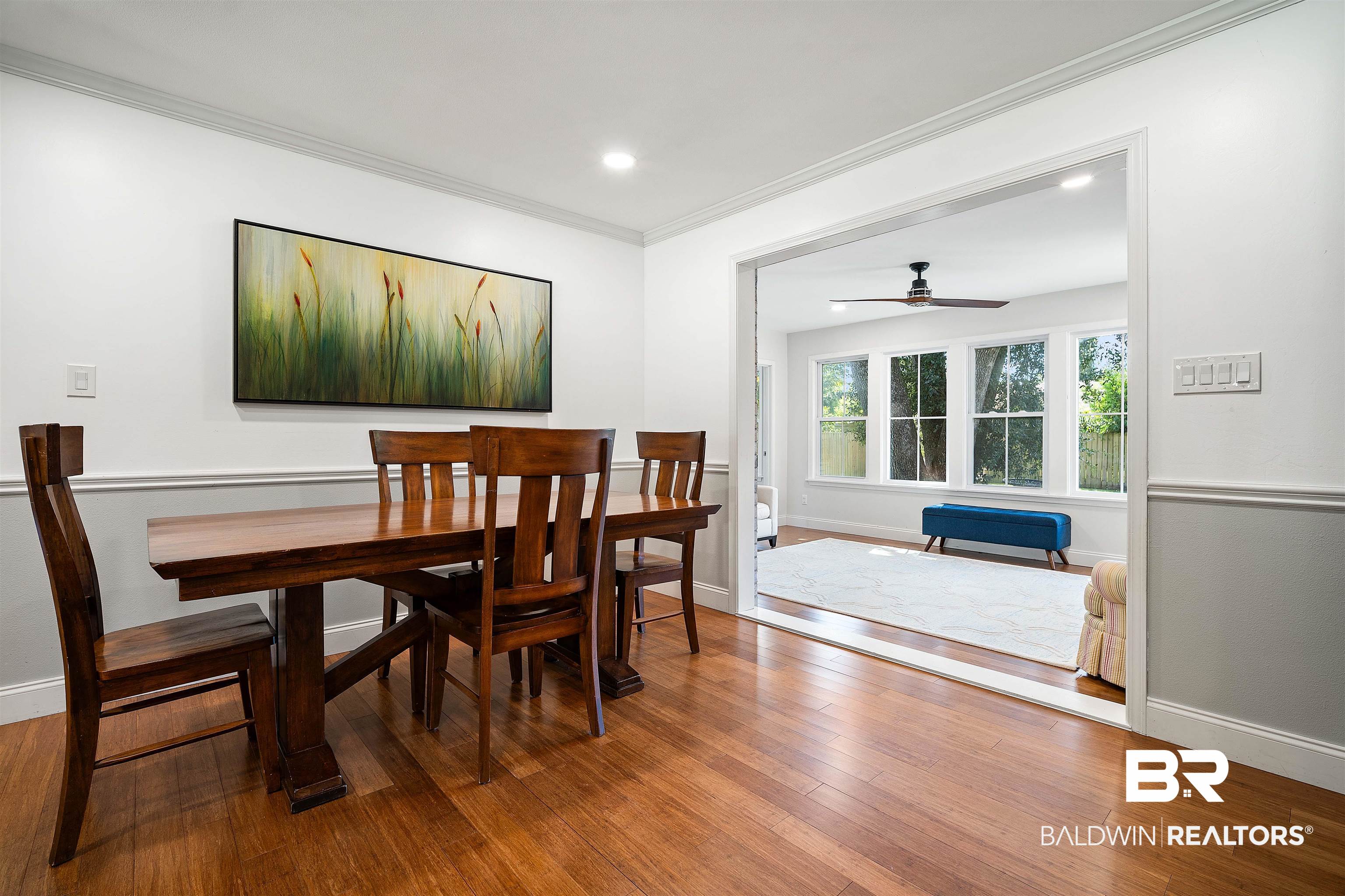 808 Michigan Avenue Fairhope, AL 36532 - Photo 14 of 33 Dining room with ornamental molding, ceiling fan, and hardwood / wood-style floors