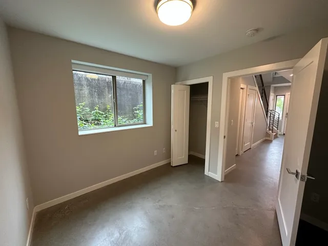 an empty room with windows