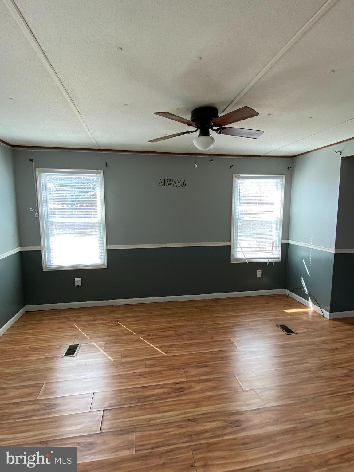 29 Chesapeake Estates York, PA 17408 - Photo 13 of 34 a view of an empty room with window and wooden floor