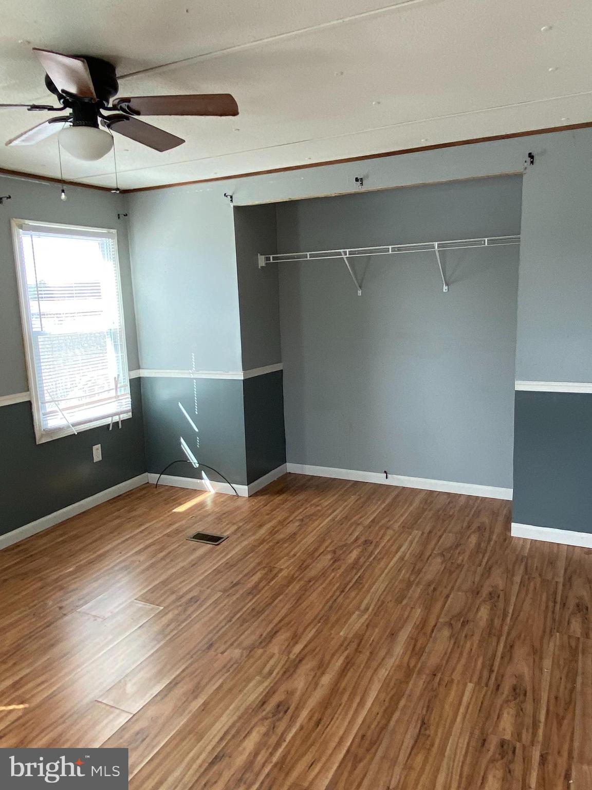 29 Chesapeake Estates York, PA 17408 - Photo 14 of 34 a view of empty room with wooden floor and fan