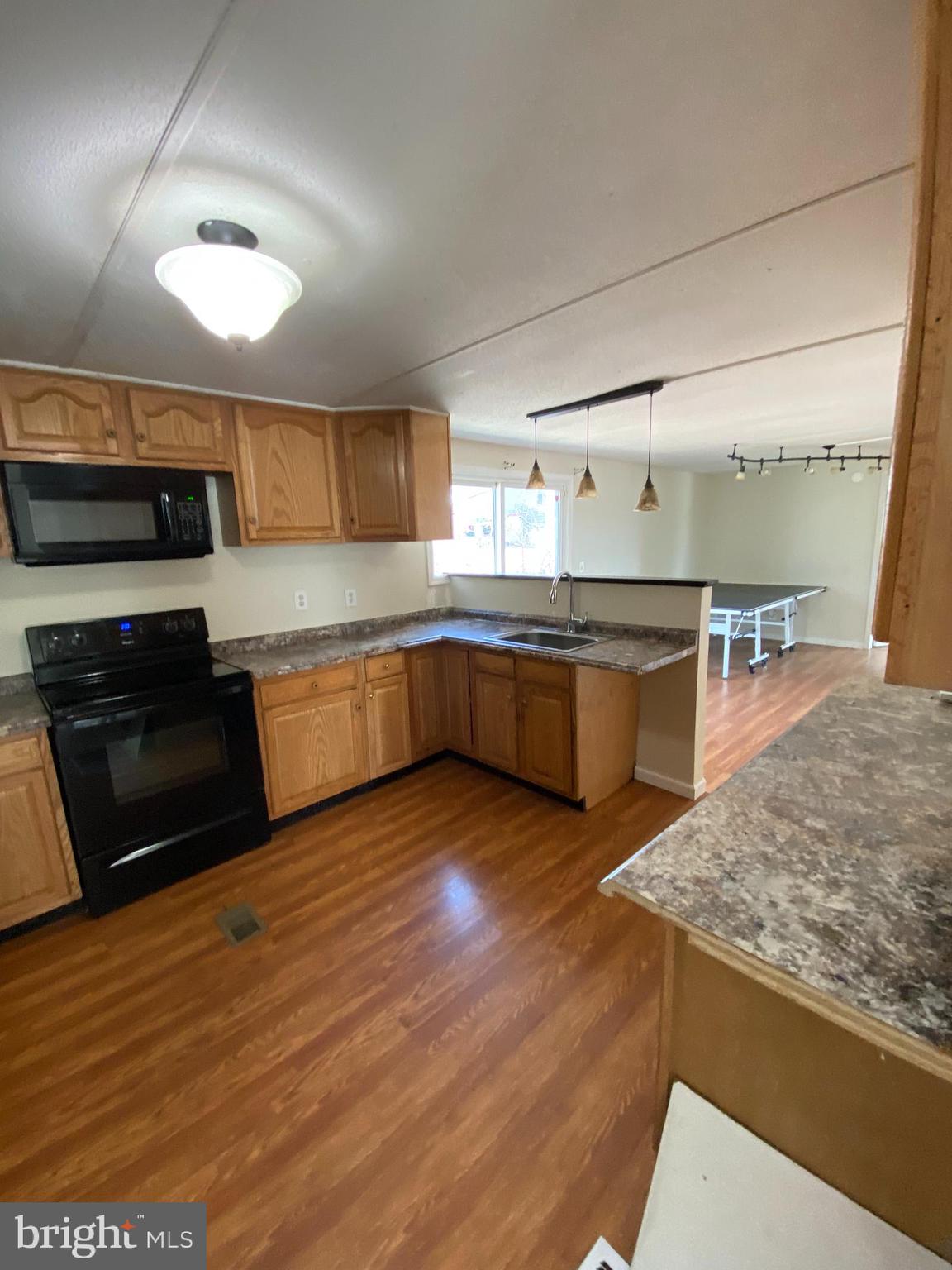 29 Chesapeake Estates York, PA 17408 - Photo 21 of 34 a kitchen with stainless steel appliances granite countertop a sink and a stove
