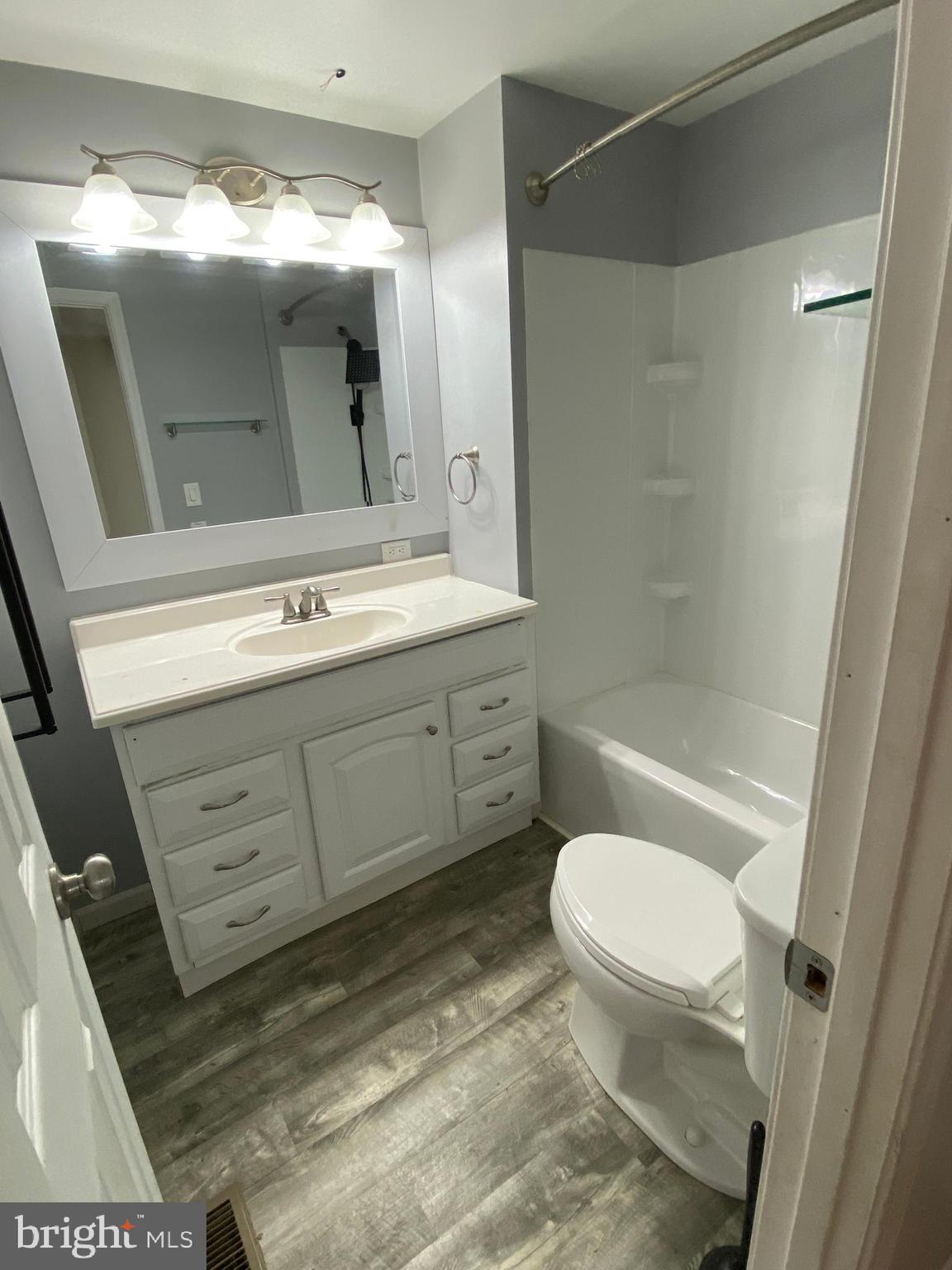 29 Chesapeake Estates York, PA 17408 - Photo 30 of 34 a bathroom with a toilet sink and mirror