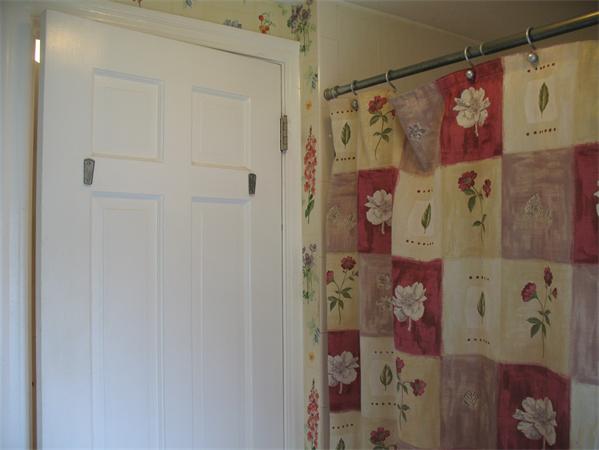 24 Maple Road Longmeadow, MA 01106 - Photo 15 of 26 a bathroom with a shower curtain