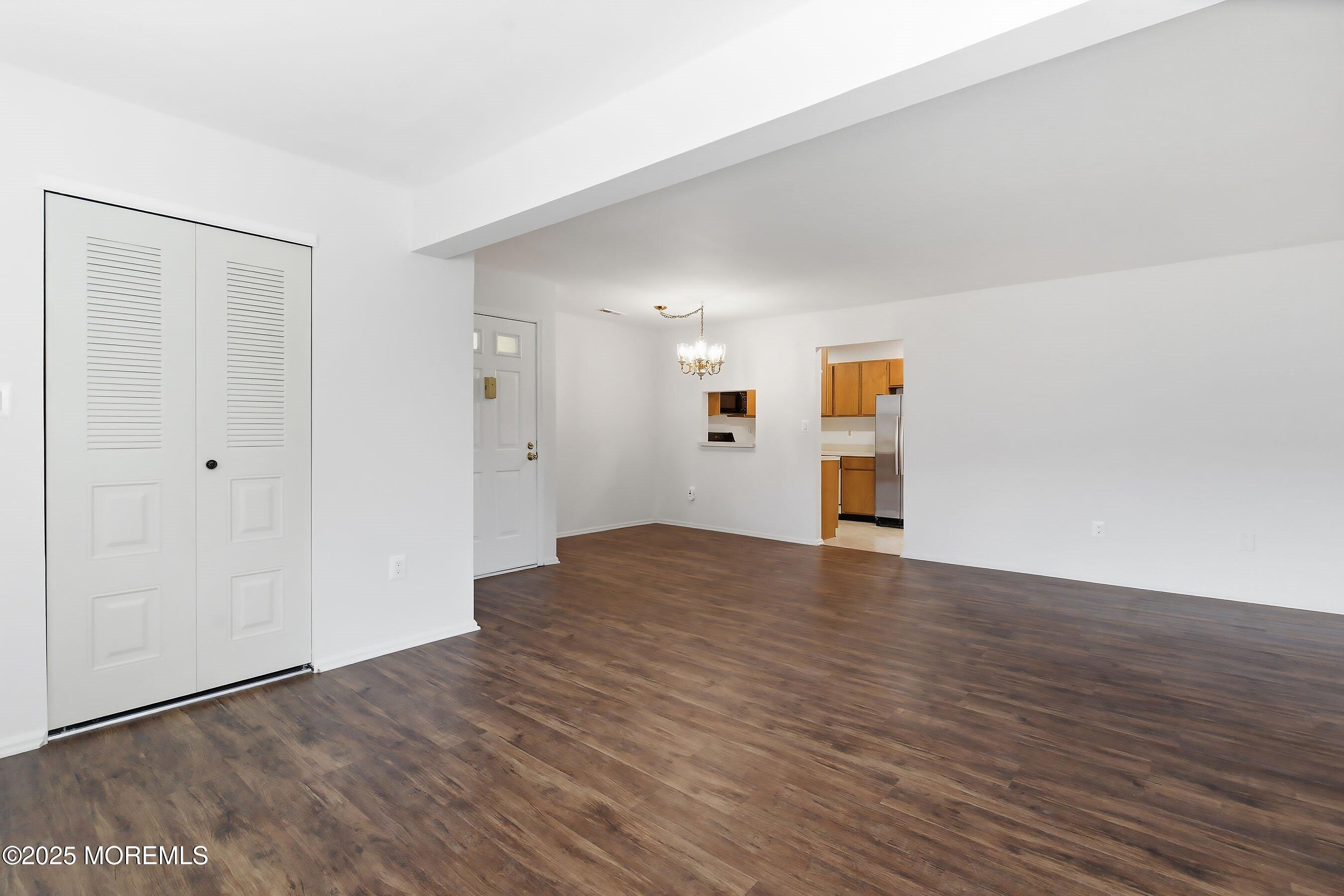 7 Boxwood Terrace, Unit 250 Red Bank, NJ 07701 - Photo 17 of 29 a view of empty room with wooden floor