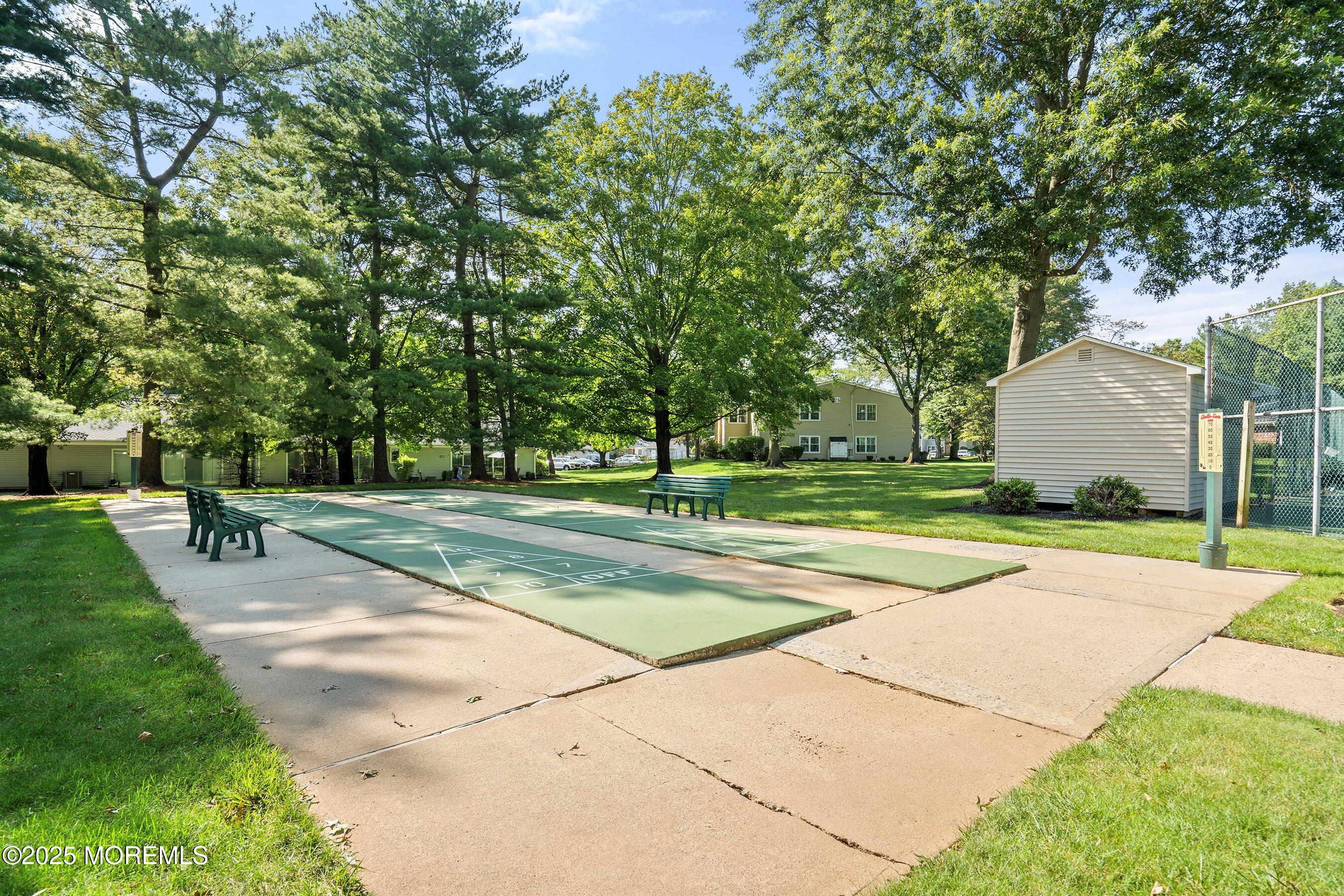 7 Boxwood Terrace, Unit 250 Red Bank, NJ 07701 - Photo 22 of 29 a view of a playground with basketball court