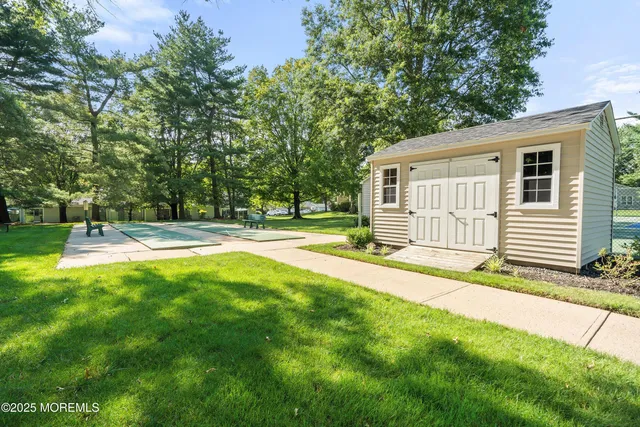 a house view with a backyard space