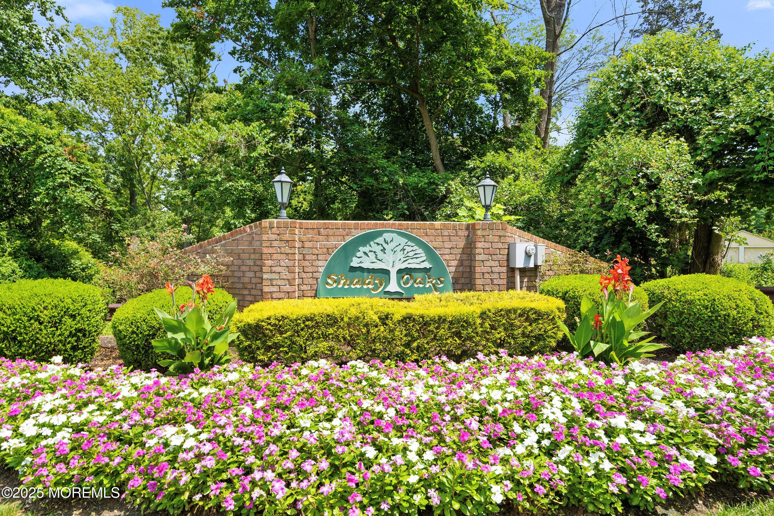 7 Boxwood Terrace, Unit 250 Red Bank, NJ 07701 - Photo 29 of 29 a view of a garden with plants