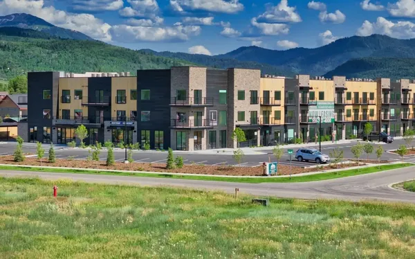 a house view with swimming pool and view of a yard