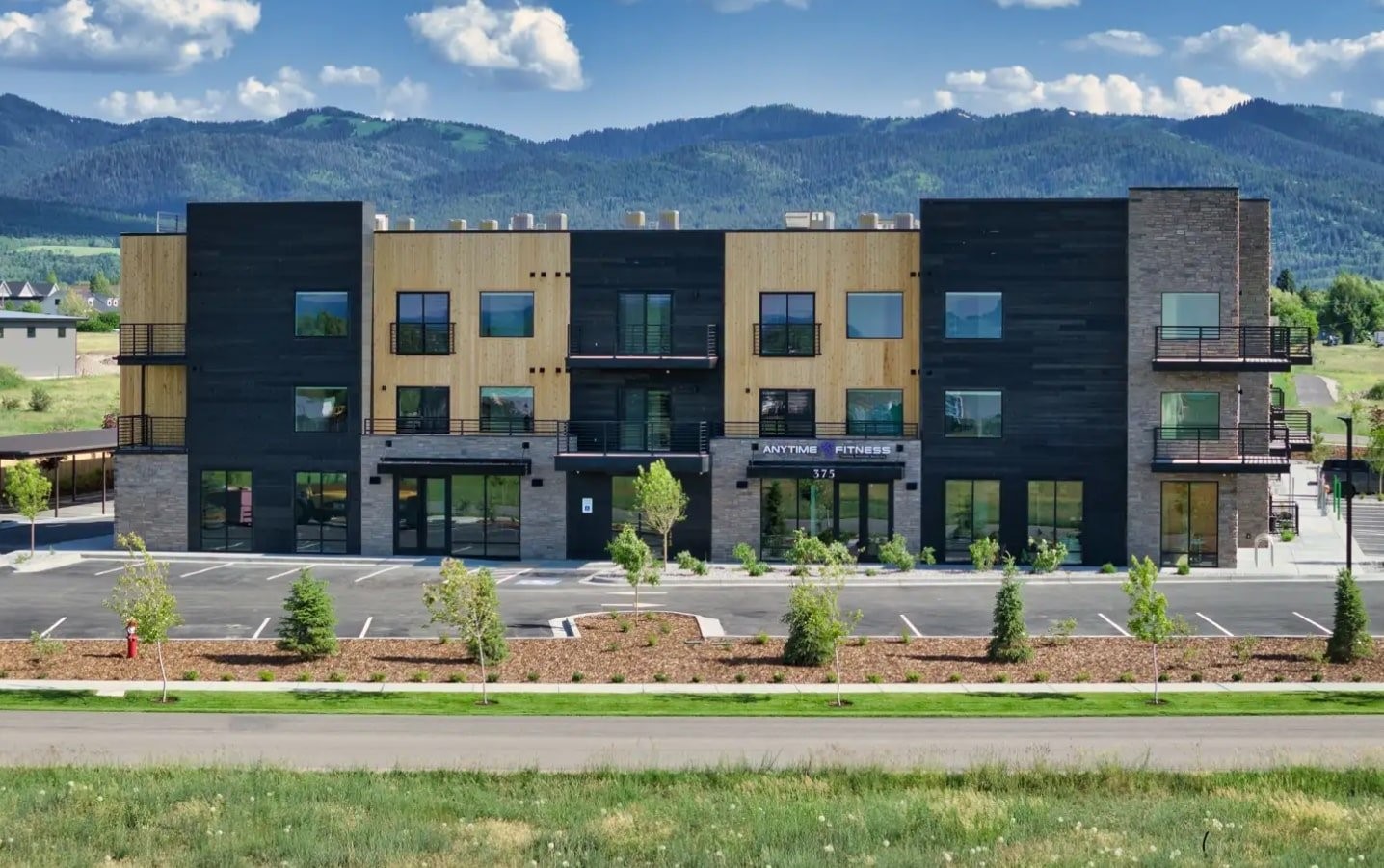 375 Larkspur Avenue Victor, ID 83455 - Photo 3 of 9 a front view of a house with a yard