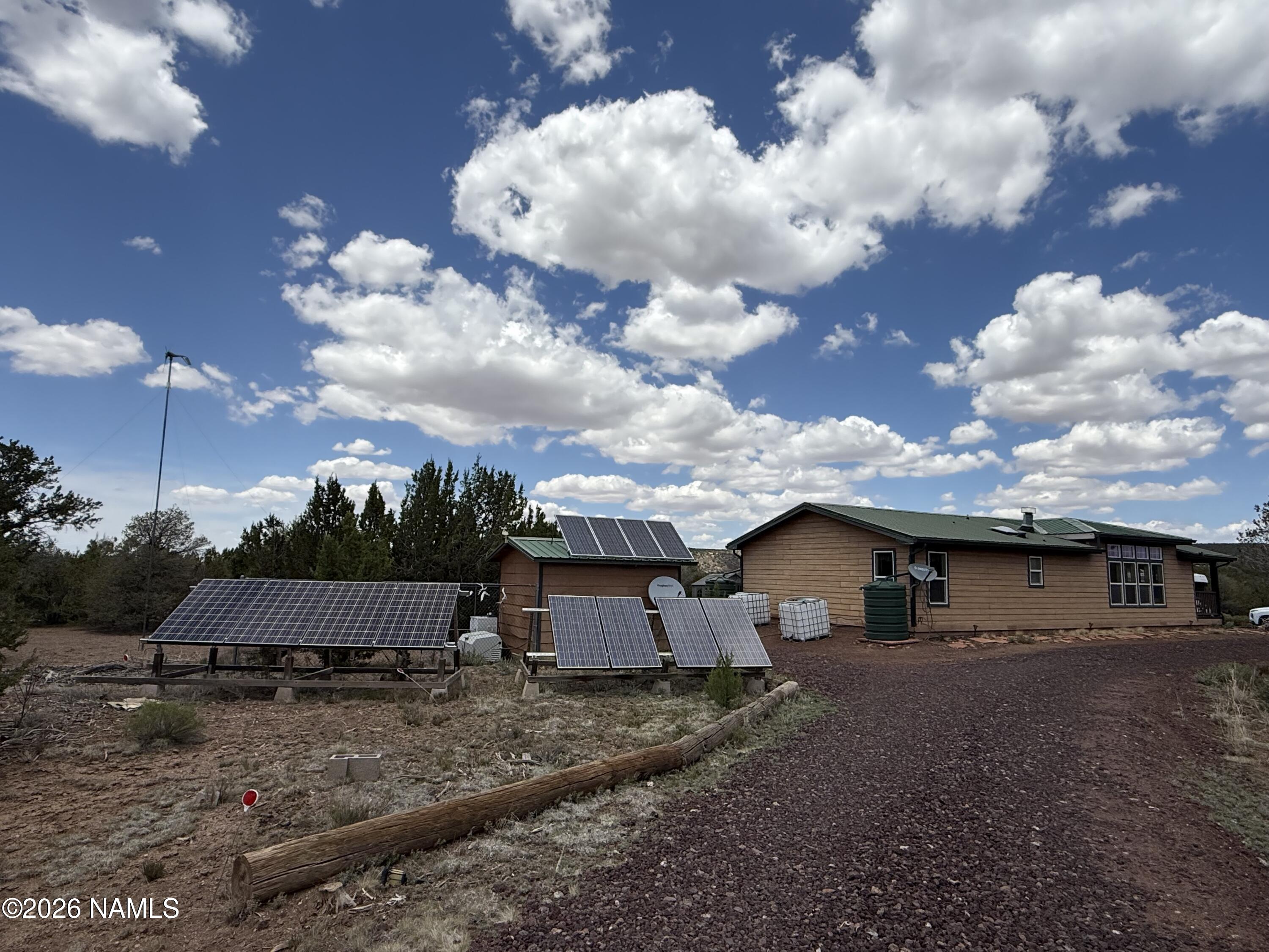 1431 East Cedar Road Williams, AZ 86046 - Photo 5 of 51 a view of a house with a yard