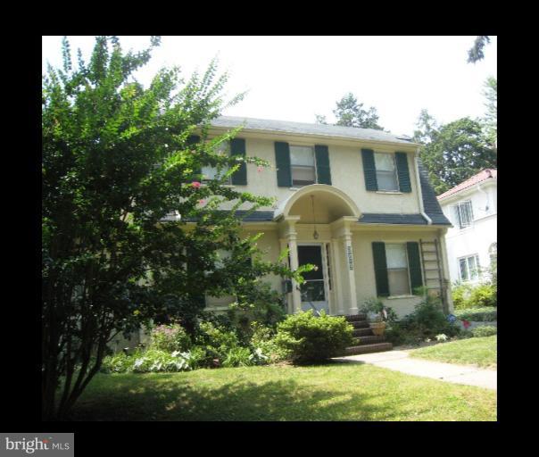 3902 Hadley Square West Baltimore, MD 21218 - Photo 14 of 30 a view of a house with yard and plants