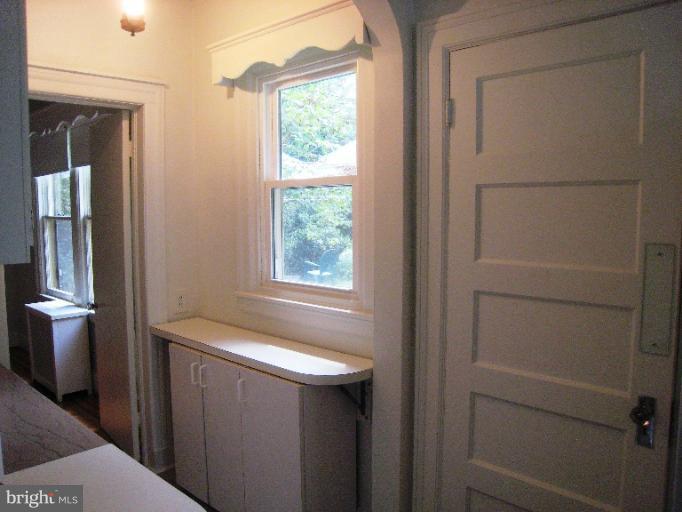 3902 Hadley Square West Baltimore, MD 21218 - Photo 18 of 30 a bathroom with a sink and a toilet