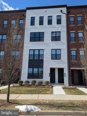 a front view of a multi story residential apartment building