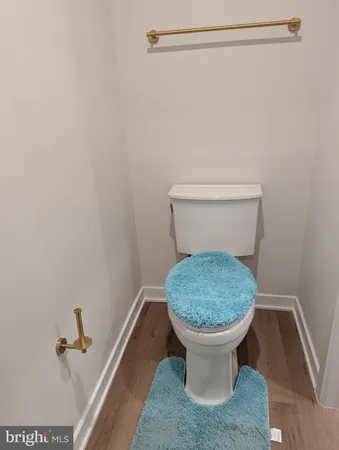a bathroom with a toilet and a sink