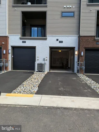 a front view of a house with yard