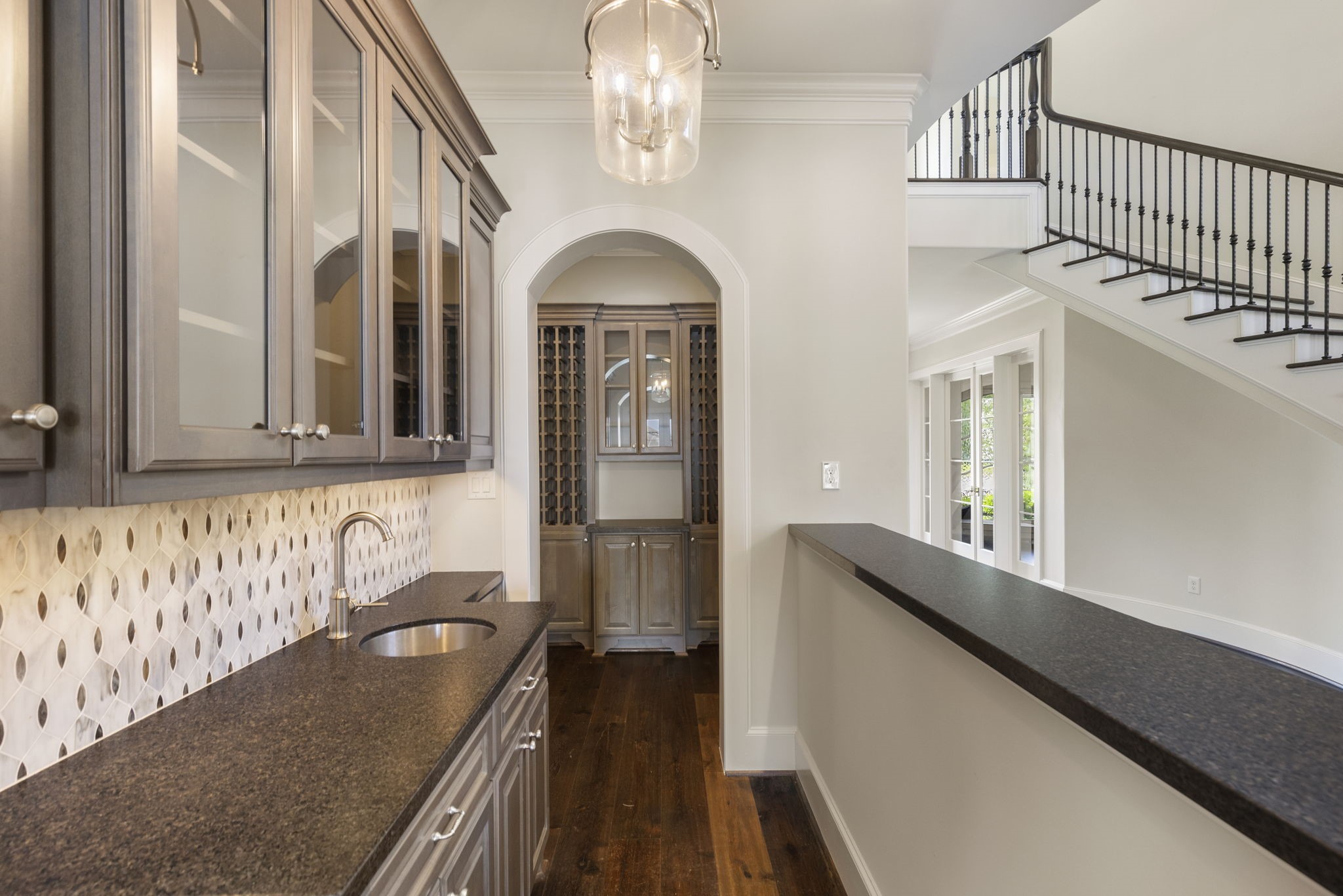 6806 West Warwick Lake Lane Spring, TX 77389 - Photo 7 of 50 a view of a hallway with entryway wooden floor and front door