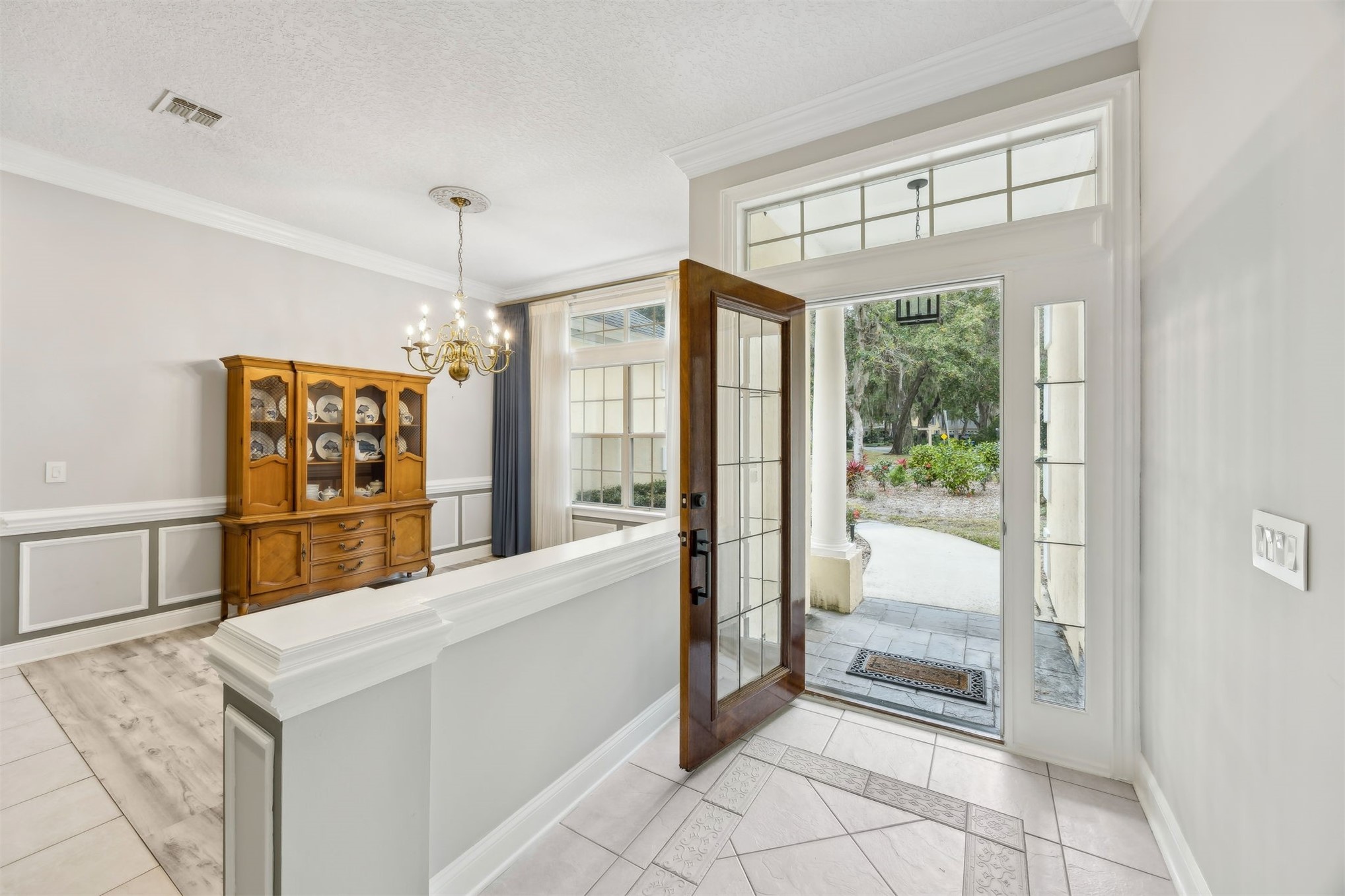4433 Bean Street Fernandina Beach, FL 32034 - Photo 11 of 79 a kitchen with stainless steel appliances kitchen island granite countertop a refrigerator and a sink