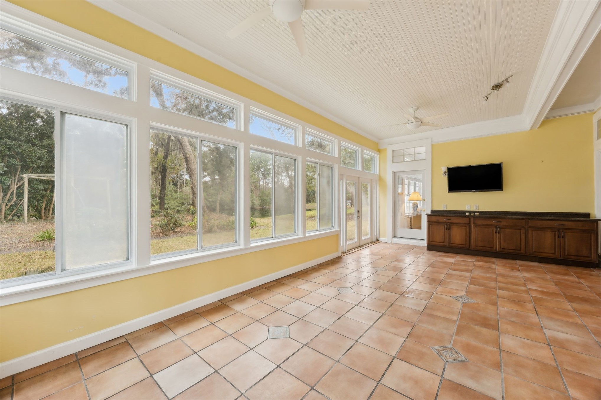 4433 Bean Street Fernandina Beach, FL 32034 - Photo 27 of 79 a view of an empty room with wooden floor and a window