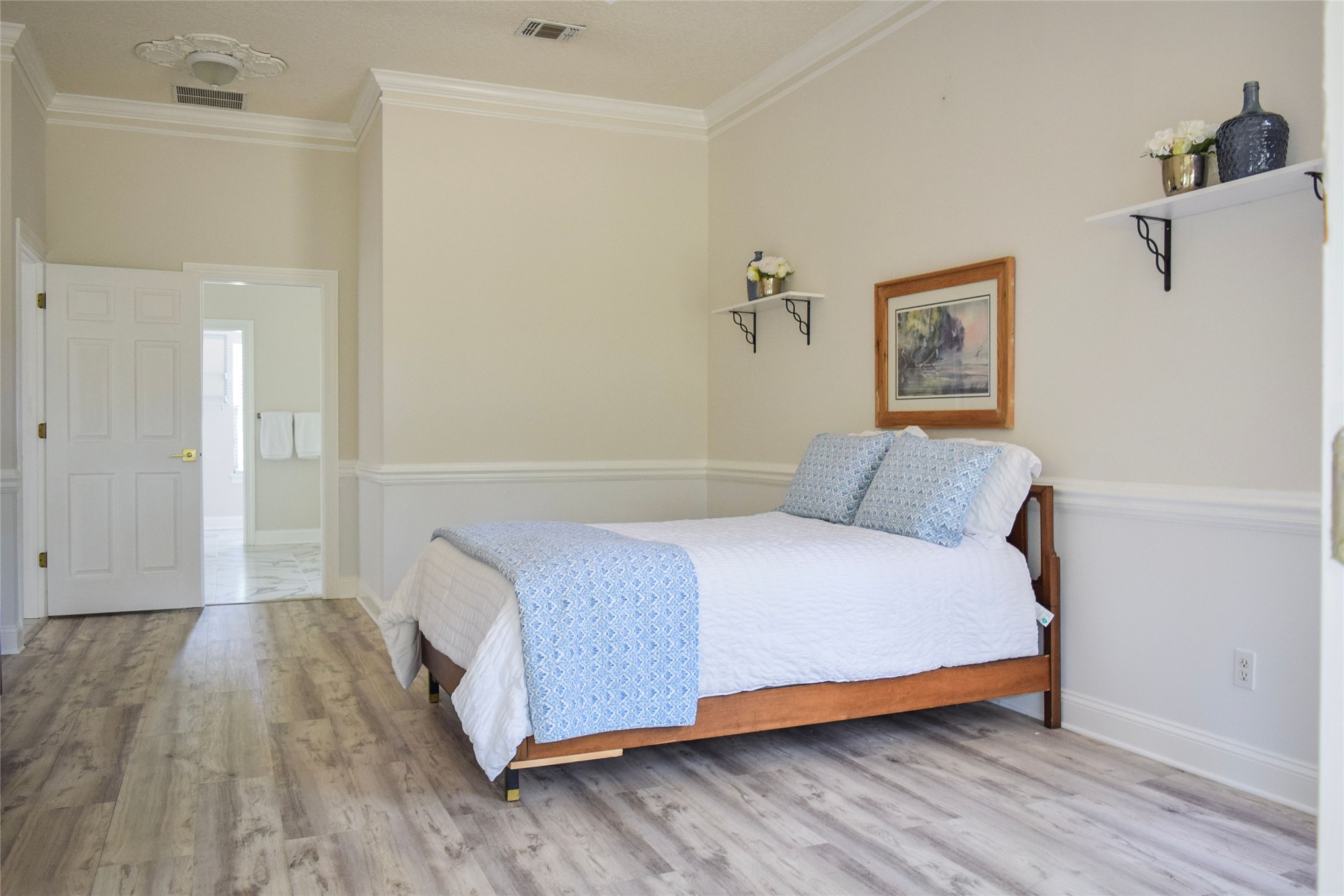 4433 Bean Street Fernandina Beach, FL 32034 - Photo 39 of 79 a bedroom with a bed and painting on the wall