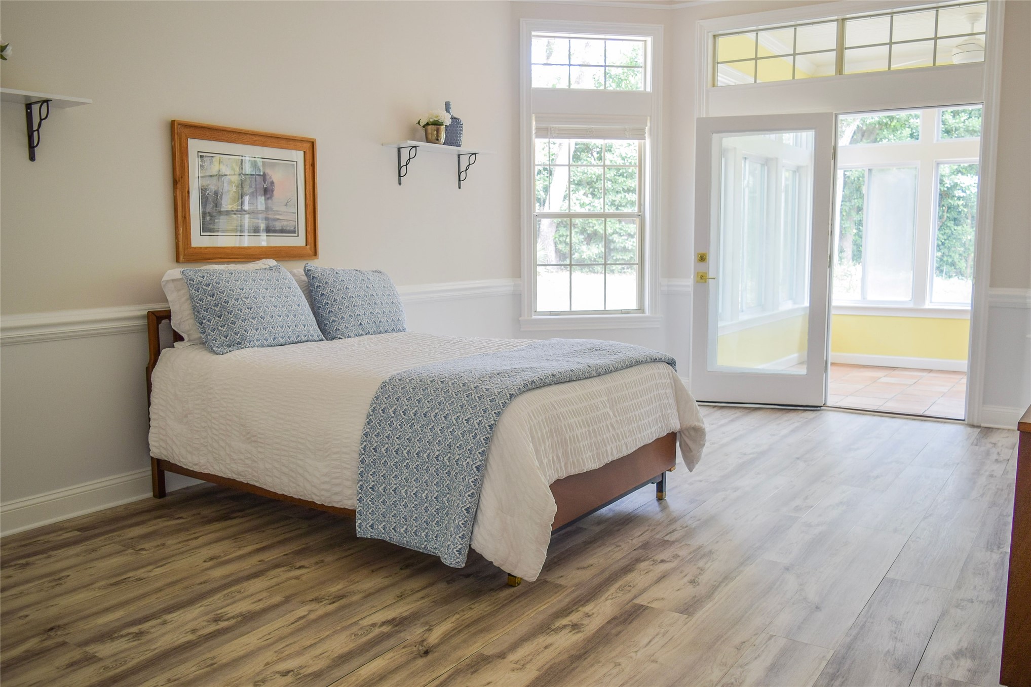 4433 Bean Street Fernandina Beach, FL 32034 - Photo 41 of 79 a bedroom with a bed and a large window
