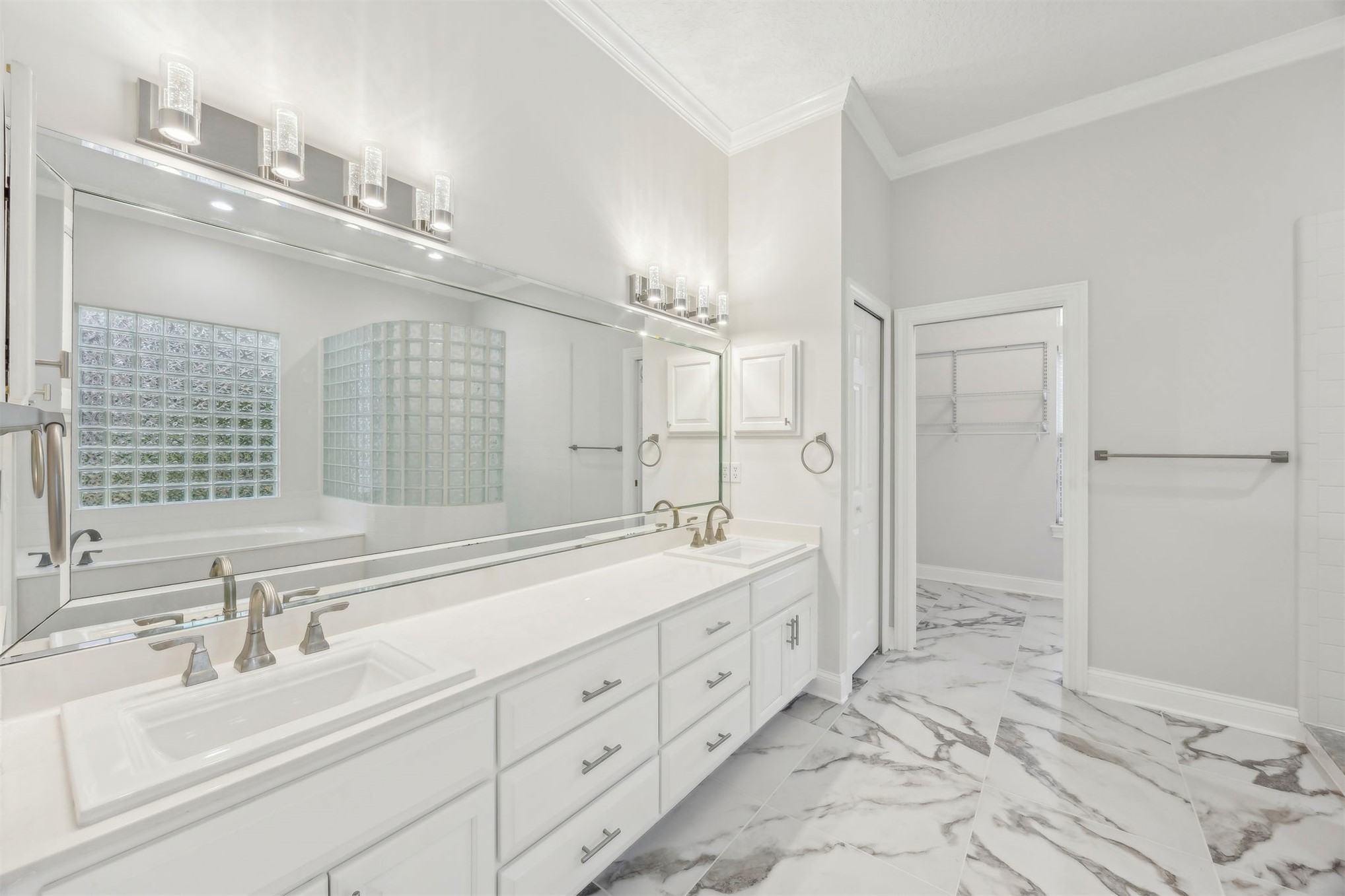 4433 Bean Street Fernandina Beach, FL 32034 - Photo 42 of 79 a spacious bathroom with a double vanity sink mirror and double