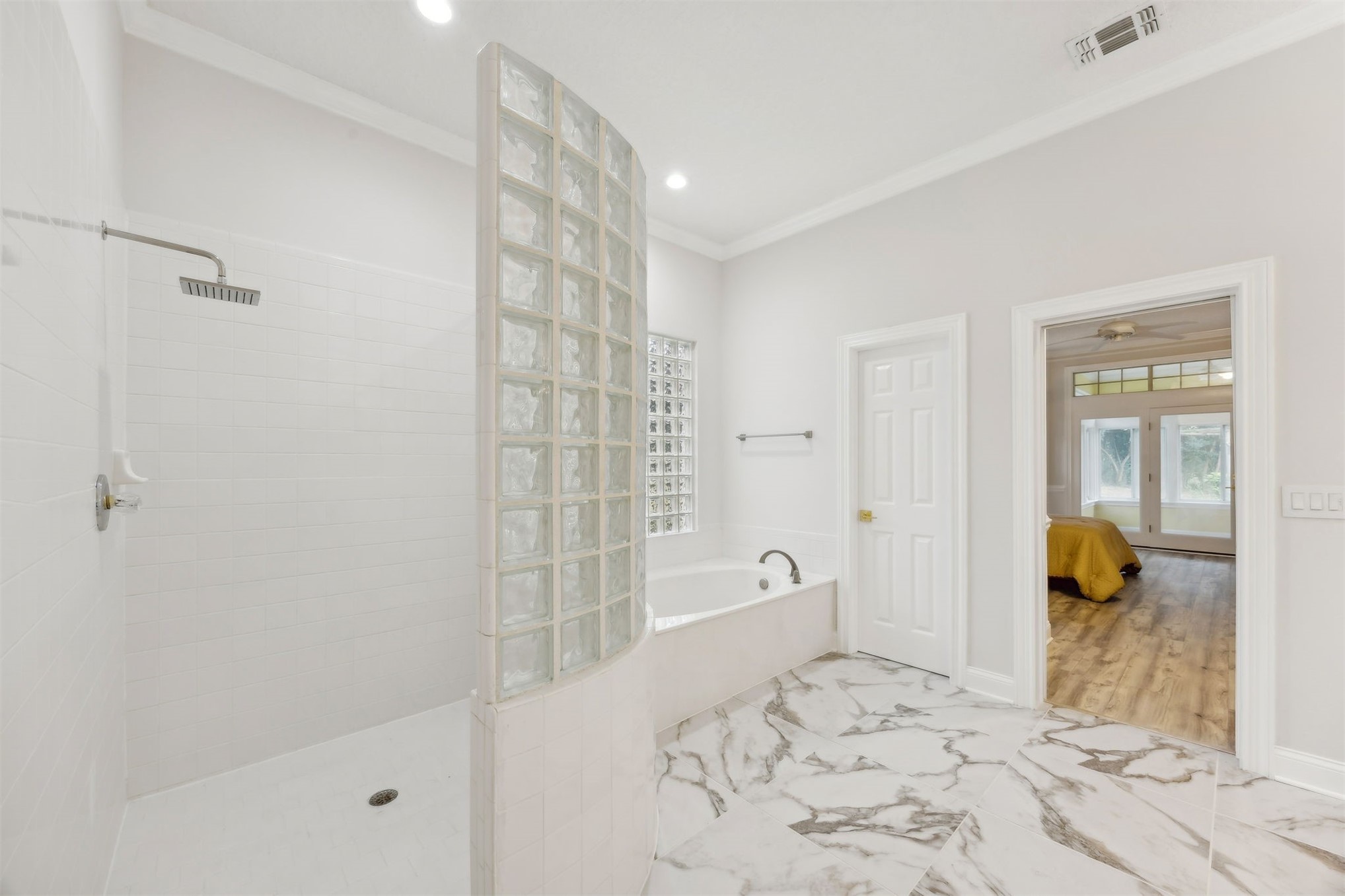 4433 Bean Street Fernandina Beach, FL 32034 - Photo 45 of 79 a bathroom with a tub shower and a sink