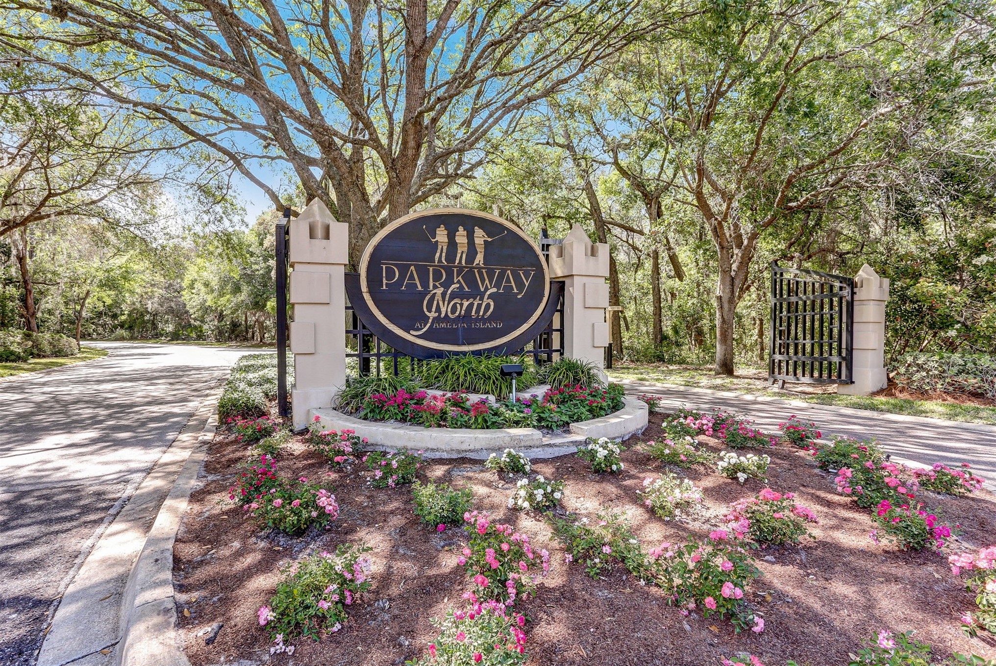 4433 Bean Street Fernandina Beach, FL 32034 - Photo 55 of 79 a sign that is sitting in front of flowers