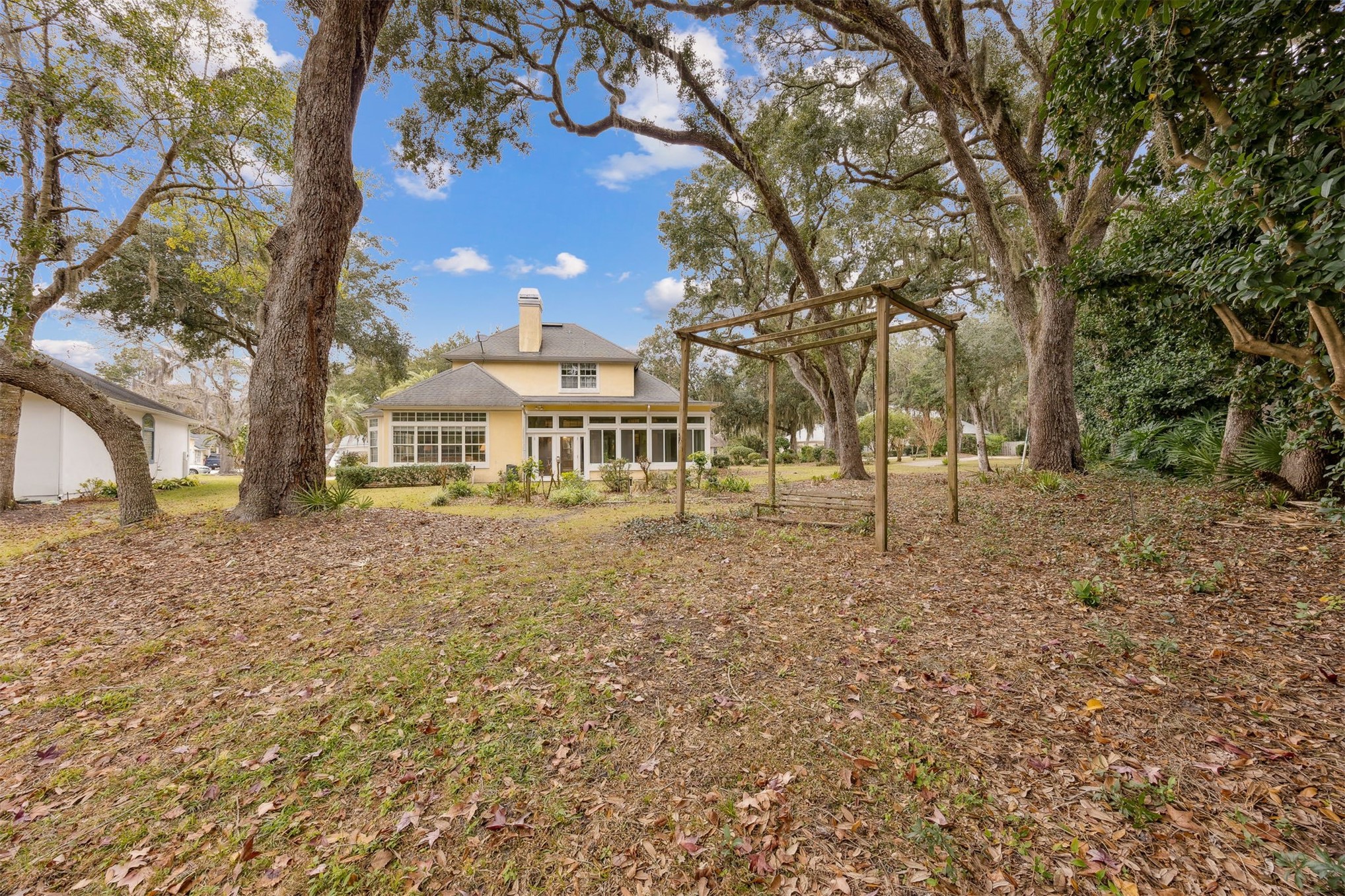 4433 Bean Street Fernandina Beach, FL 32034 - Photo 60 of 79 a view of a house with a yard